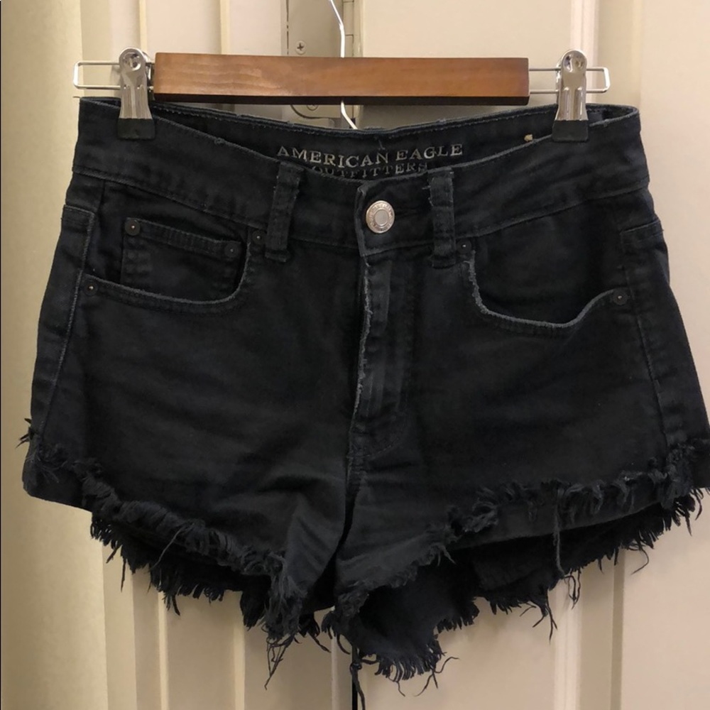 Distressed black jean shorts